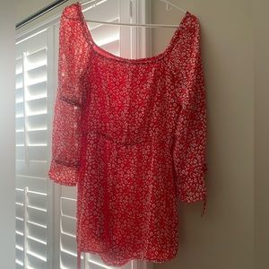 Red patterned romper size M NWT